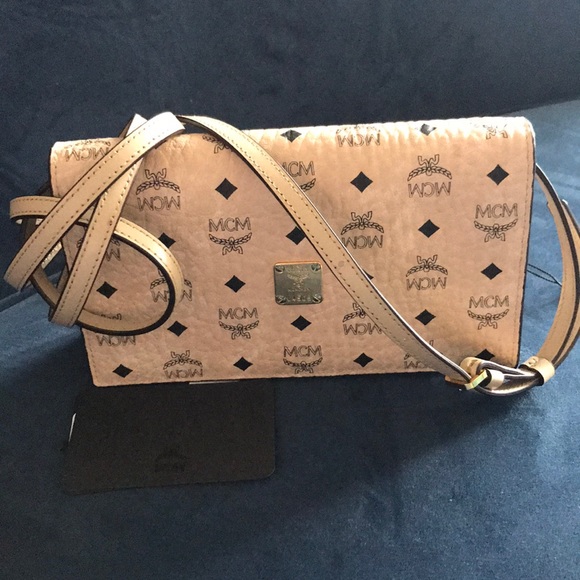 MCM Handbags - MCM large cross body wallet
